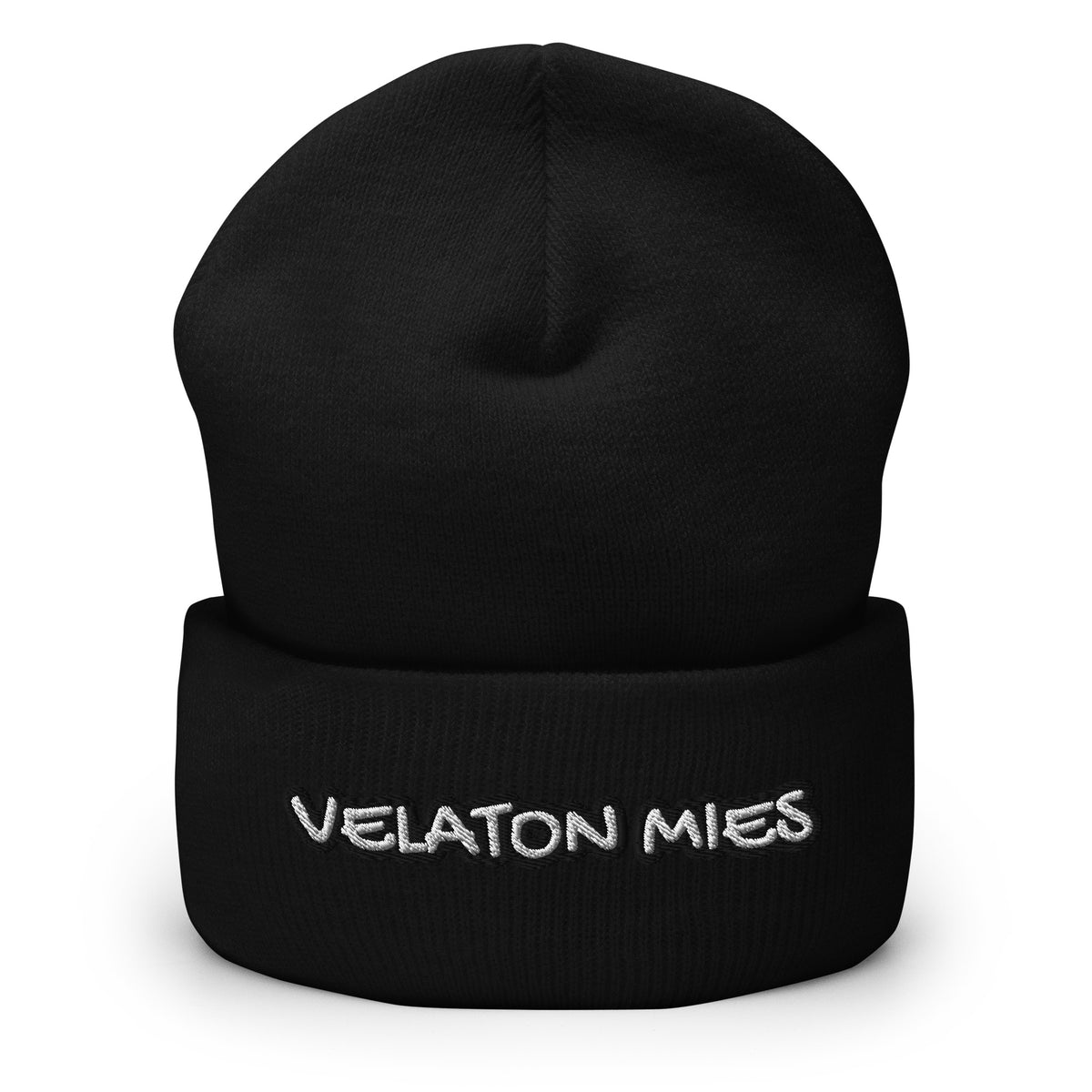 Meemirottan Velaton Mies Pipo on lihavoitu punainen taitettu reunus pipo, jossa on kirjailtu teksti "VELATON MIES" lihavoituin, leikkisillä valkoisilla kirjaimilla, jotka on rajattu mustalla ääriviivalla - ihanteellinen lahjaidea meemivaatteiden ystäville.