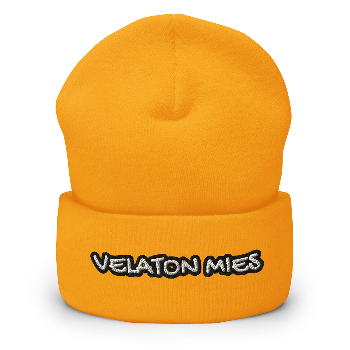 Meemirottan Velaton Mies Pipo on lihavoitu punainen taitettu reunus pipo, jossa on kirjailtu teksti "VELATON MIES" lihavoituin, leikkisillä valkoisilla kirjaimilla, jotka on rajattu mustalla ääriviivalla - ihanteellinen lahjaidea meemivaatteiden ystäville.
