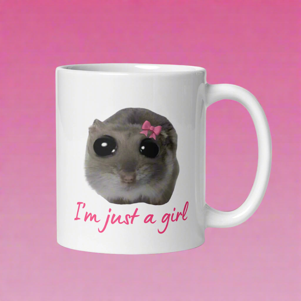 Hauska muki lahjaksi, jossa on söpö eläinkuva ja teksti I'm just a girl
