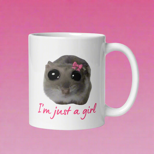 Hauska muki lahjaksi, jossa on söpö eläinkuva ja teksti I'm just a girl
