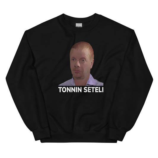 Mustassa collegepaidassa on tonnin seteli -kuva ja teksti keskellä etupuolta
